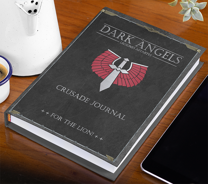 Dark Angels Crusade Journal on a wooden surface with a phone and cup in the background